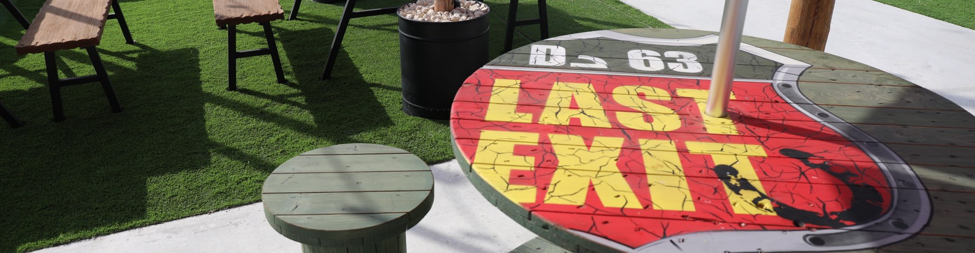 last exit logo on wooden table 